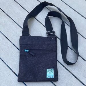 Dakine Black Crossbody Bag with Floral Accent